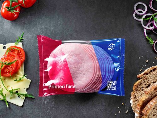 Picture showing a coloured flexible food film packaging with ham inside 
