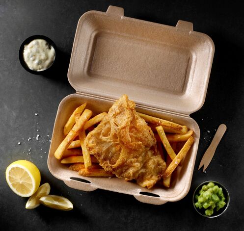 the picture is showing a food to go packaging tray with fish and chips inside