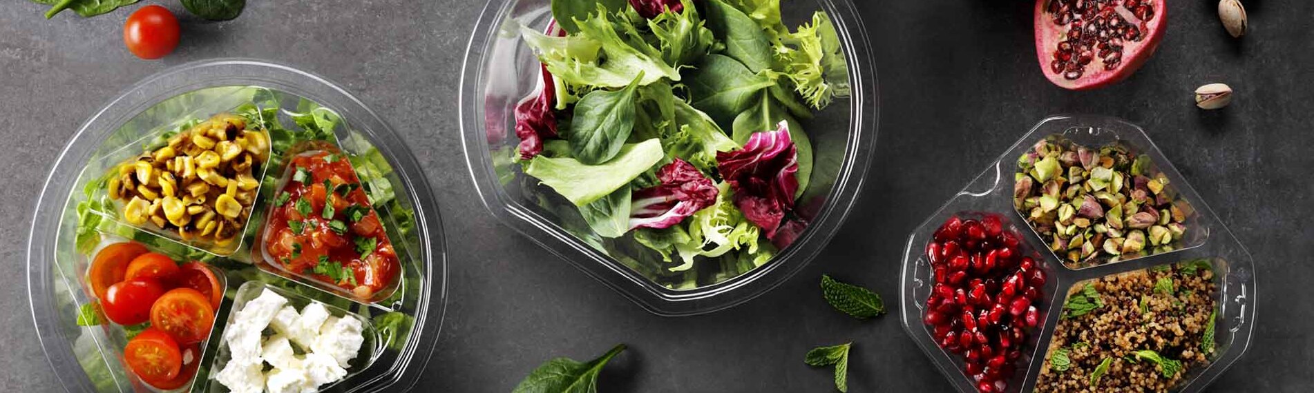 A food PET rigid film packaging showing three different salad pots