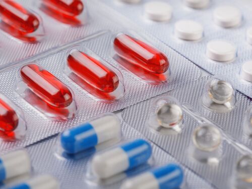 Various transparent pharmaceutical blister packaging films with different colors of pills