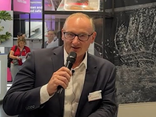The picture shows Paul Rawlings, Launch Manager in kp’s Food Packaging division wit a microphone at an external event