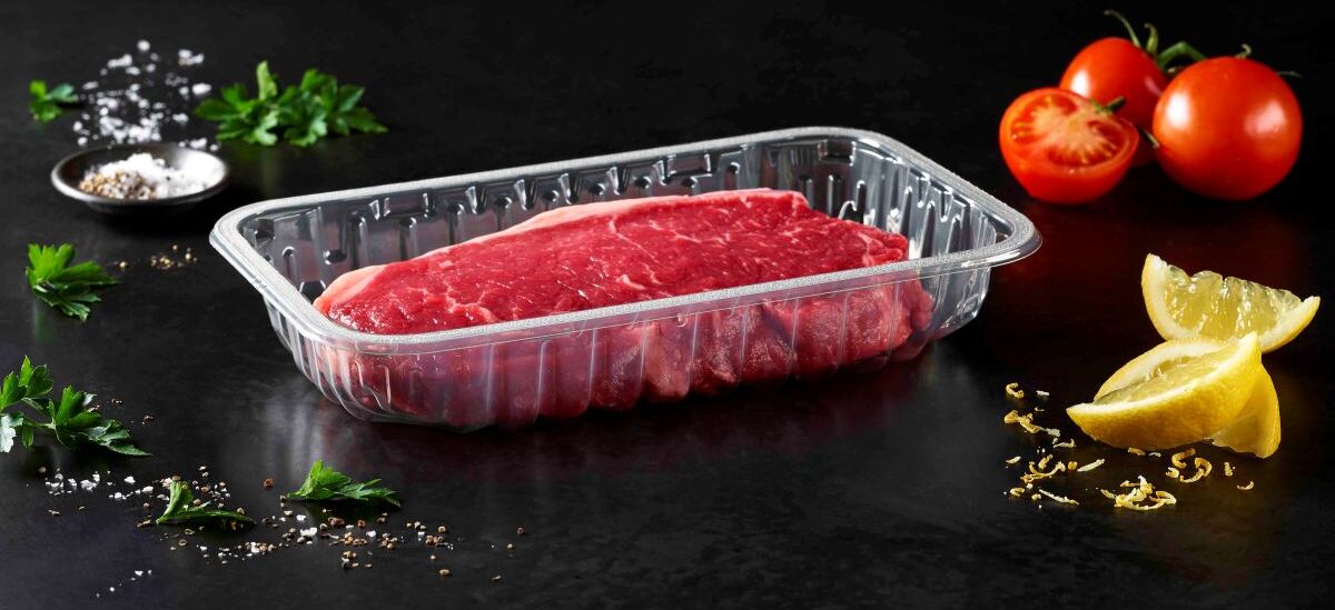 The Picture shows a transparent food packaging with meat inside