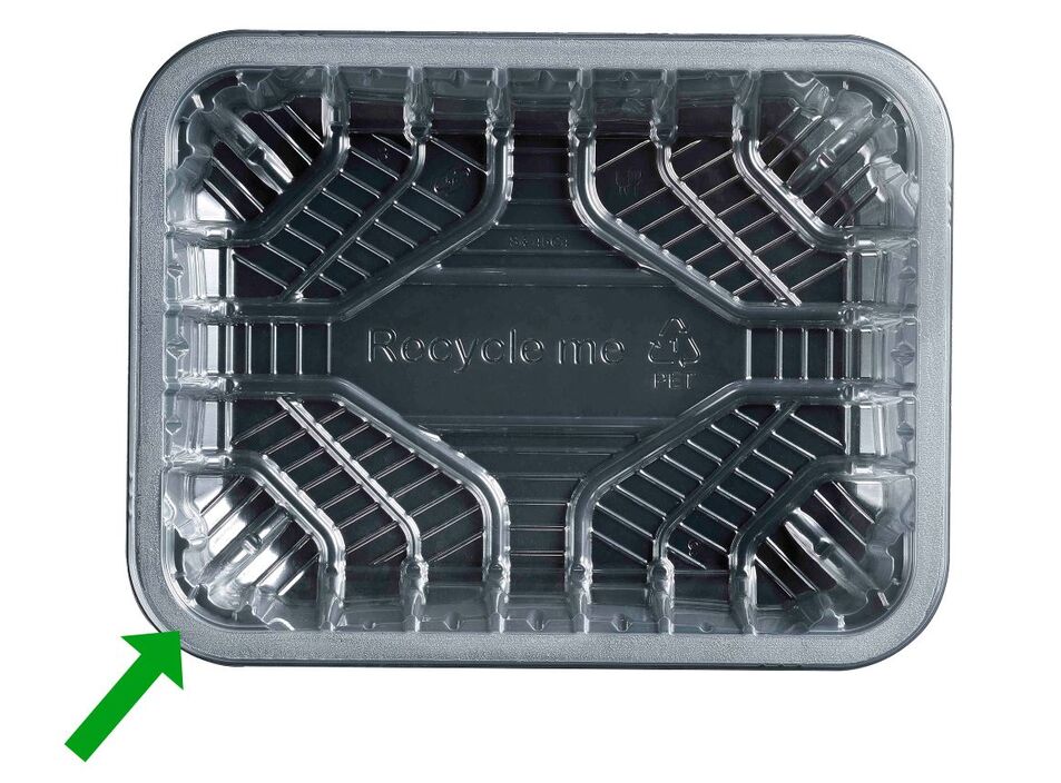 Picture shows an Elite food packaging tray with a green arrow pointing to the flange