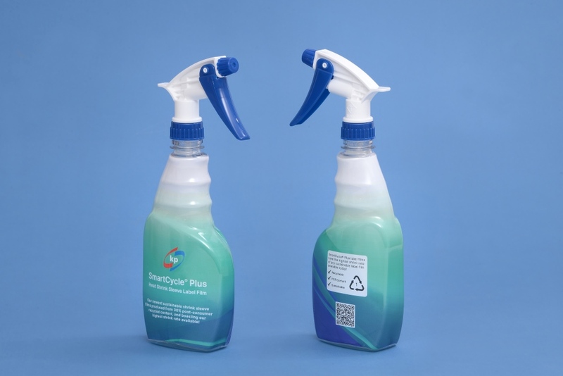 two bottles of cleaner with a Smartcycle Plus heat shrink sleeve label on it
