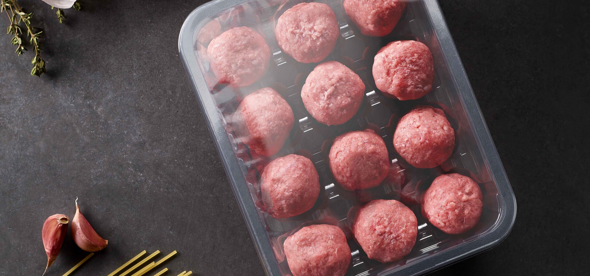 sausage wrapped in plastic film 