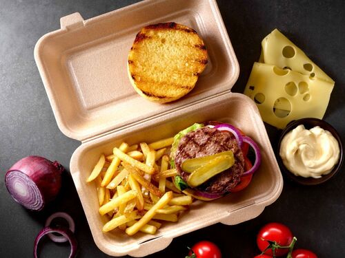 Picture showing a food to go packaging tray with burger and fries included