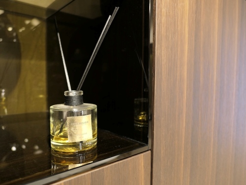 The Picture shows a dustproof cabinet  with decorative films in a brown colour 