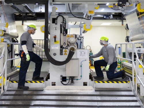 Work Smarter, a group of people working in a food factory